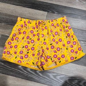 NWOT Carter’s girls floral design shorts. Size 14.